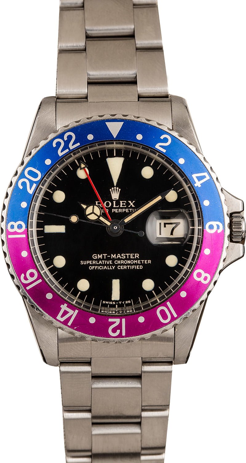 3 Favorite Vintage Rolex Watches We Love for April GMT-Master 1675 Gilt Dial Fuchsia Bezel