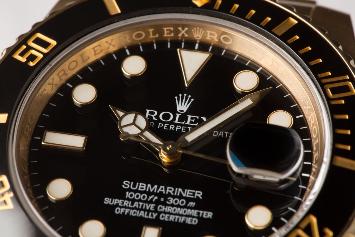 Gold Rolex Submariner Black Dial