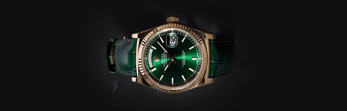 rolex with green face