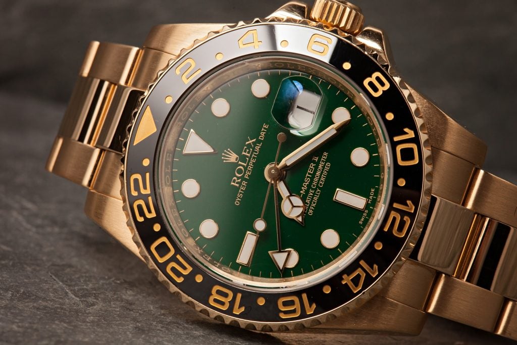 yellow gold rolex GMT-Master II anniversary dial
