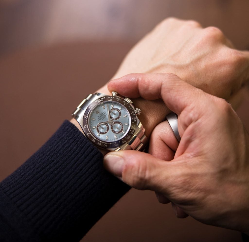 wearing a Mens Rolex on wrist wearing a Mens Rolex on wrist